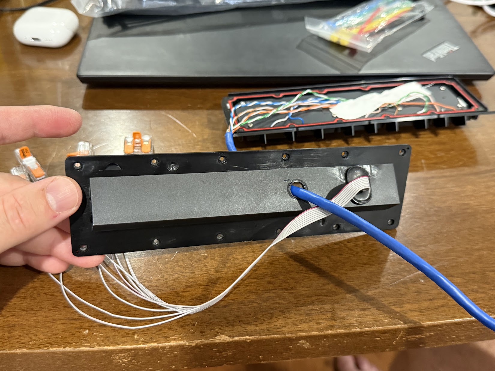 Fully taped remaining wires. Drilled a hole for the cable in the Button Board Case