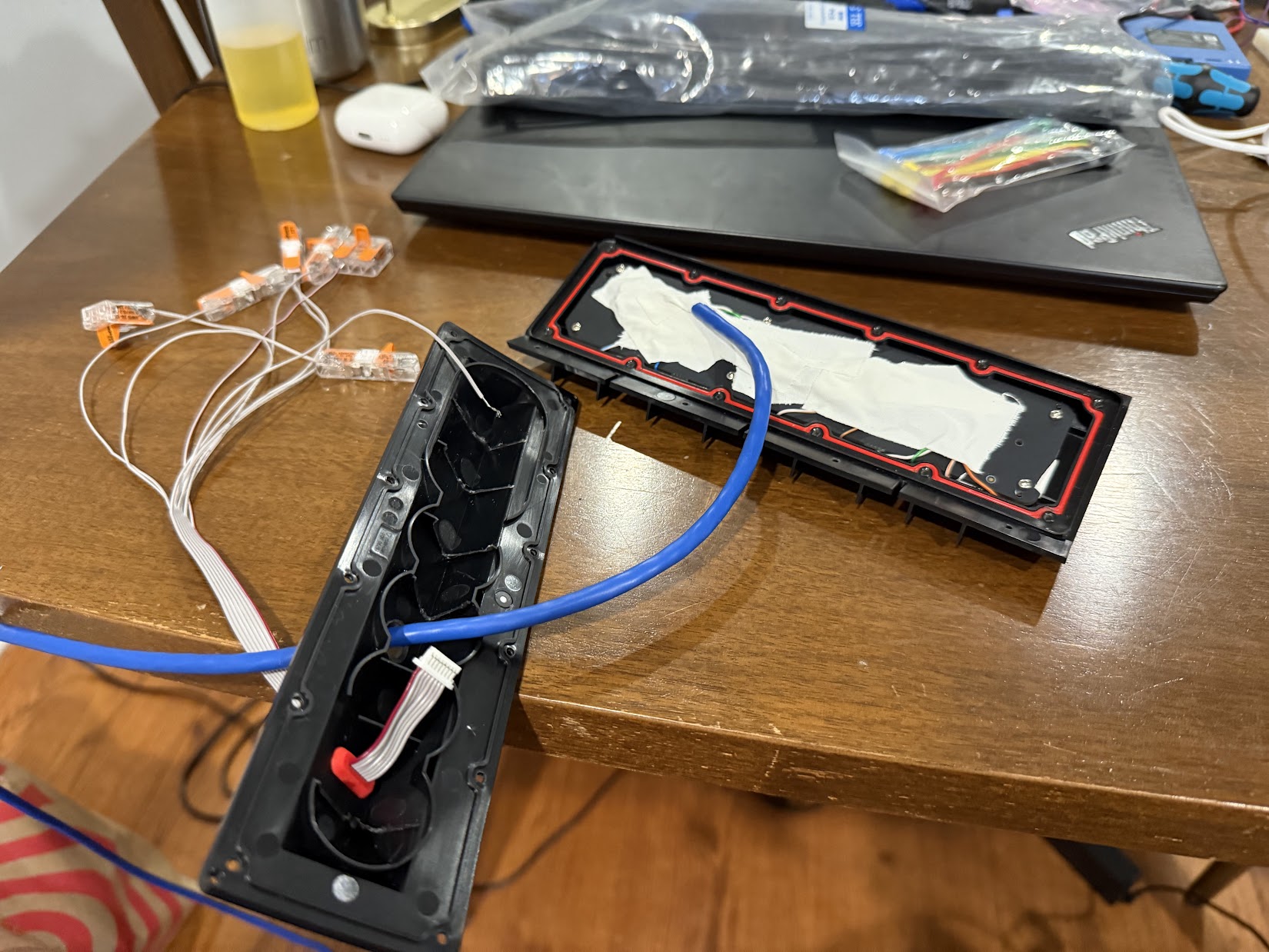 Fully taped remaining wires. Drilled a hole for the cable in the Button Board Case