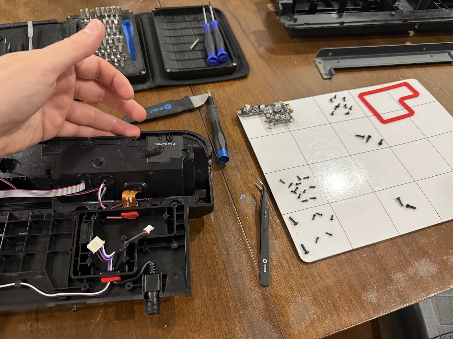 Screws removed from the camera/brain module